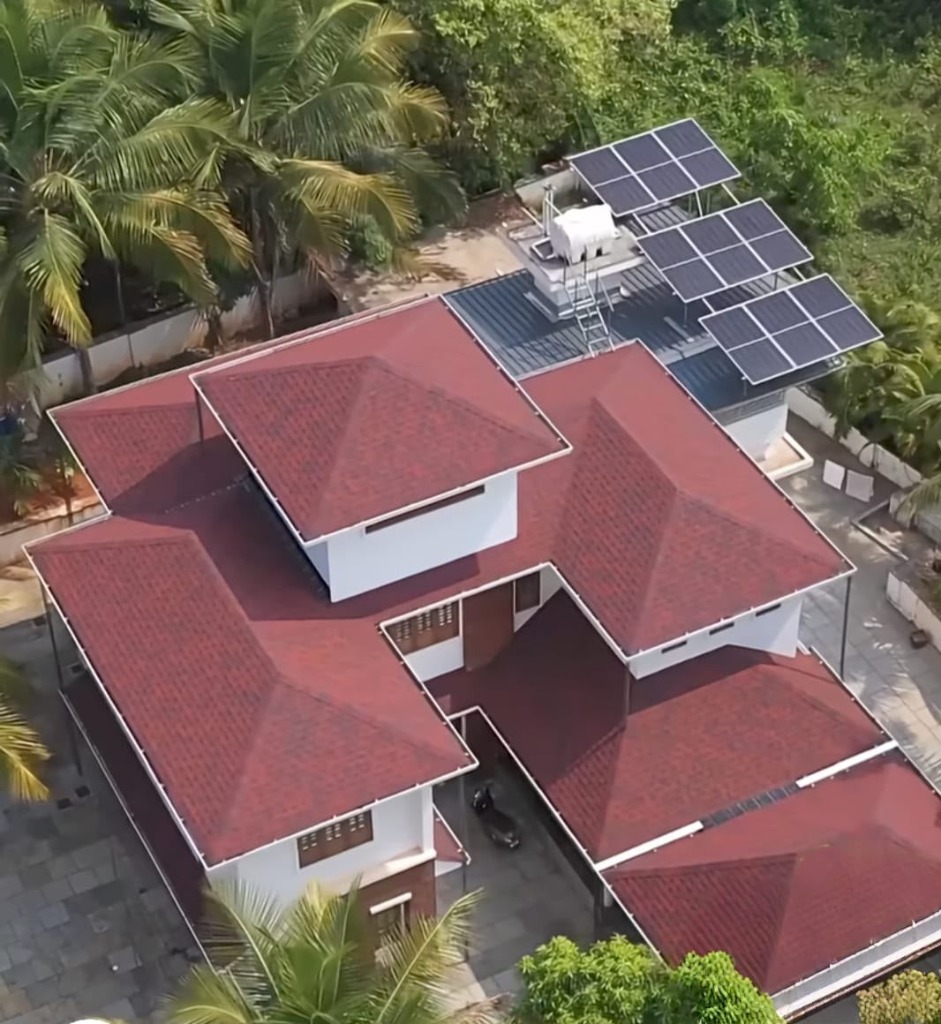 Luxury villa with premium red shingles by Roofopolis