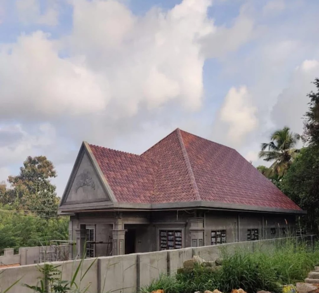Clay tile villa roof structure under construction by Roofopolis