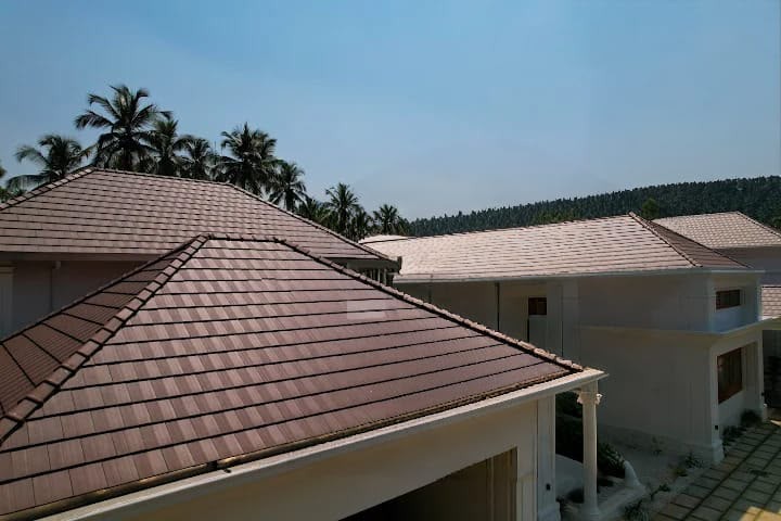 Grey flat tile pyramid roof structure