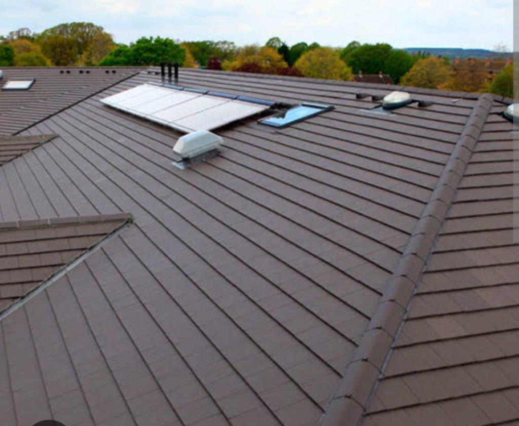Lamit premium brown flat tile roof on multi-gable estate