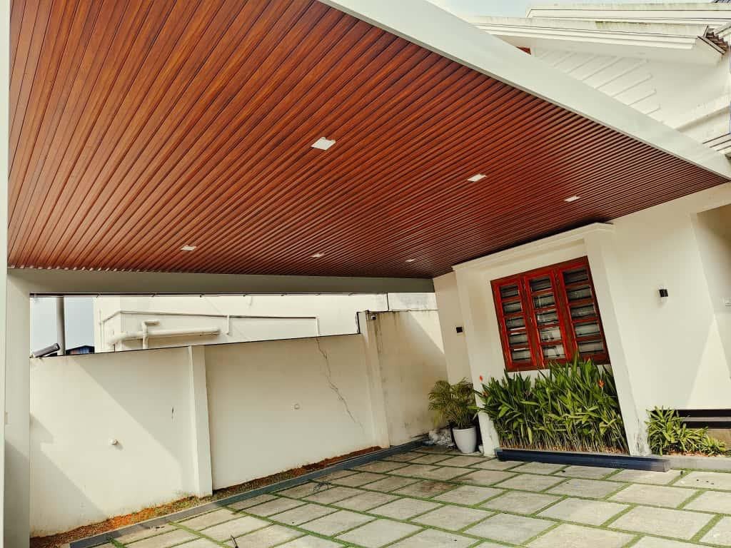 Modern balcony with flat wood soffit extension