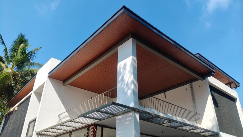 Carport ceiling with seamless wood paneling